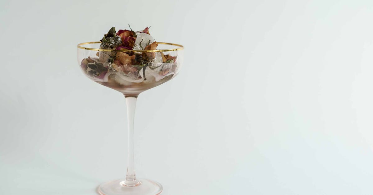 Can I freeze dried rice noodles after they've been rehydrated? - Glass of melting ice with dried flowers