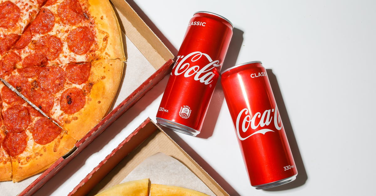 Can I make a béchamel sauce with coconut cream? - Coca Cola Cans Beside Pizza