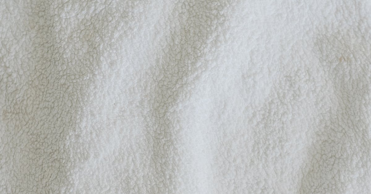 Can I make my crumble topping in a mixer? - Top view full frame of soft white towel fabric placed on table in light room