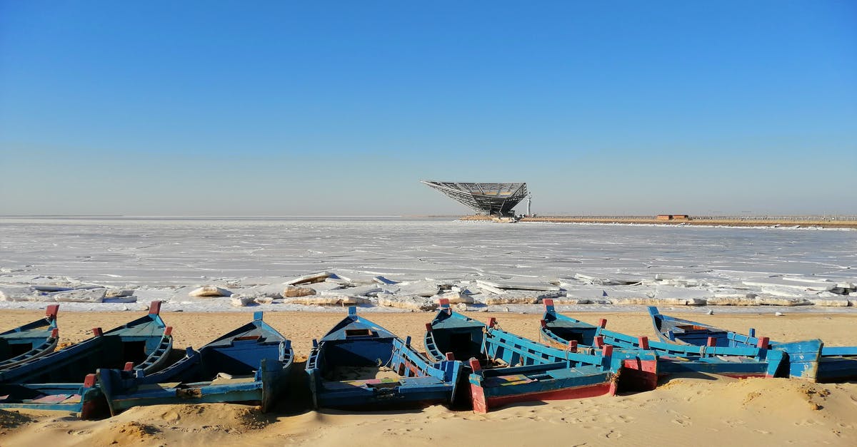 Can I make salt cod from frozen cod? - Ice Floes on Ocean and Blue Boats on Shore