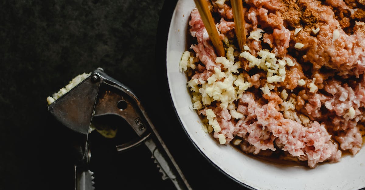 Can I mince garlic in advance? - Minced Meat in a Ceramic Bowl