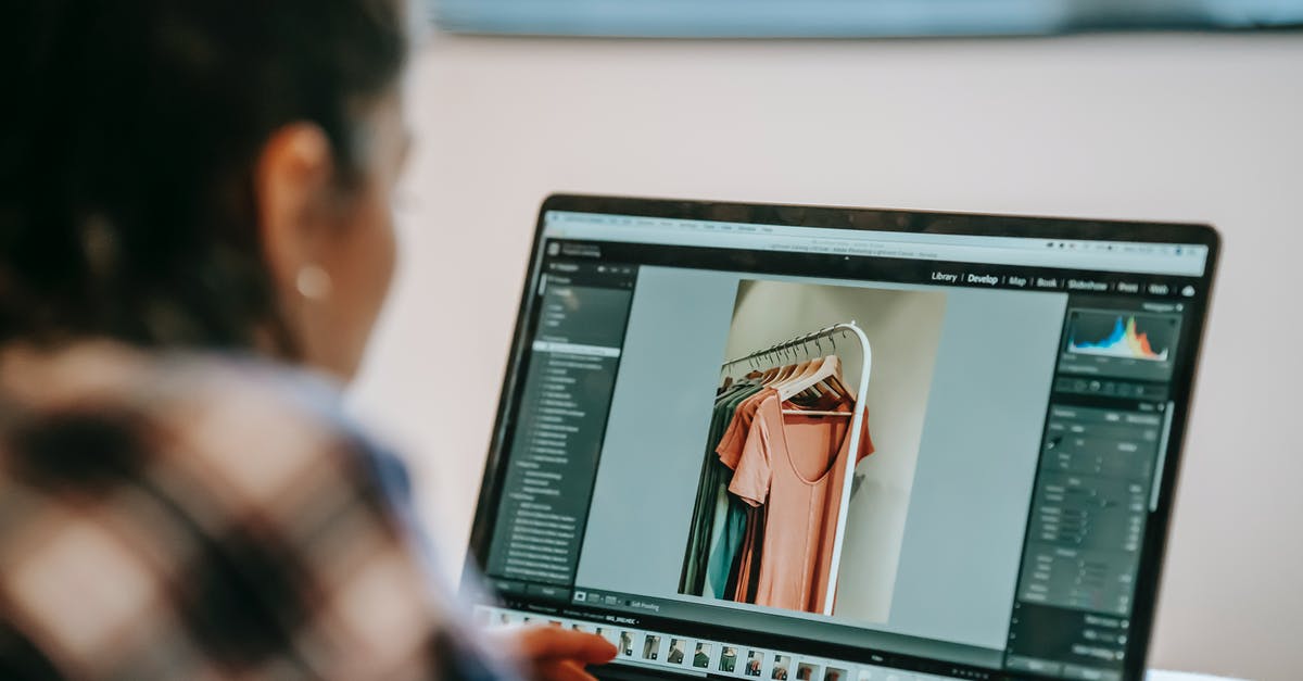 Can I put meat on a broiler rack without using foil? - Back view of crop anonymous ethnic female freelancer retouching photo with outfit on netbook while working in house