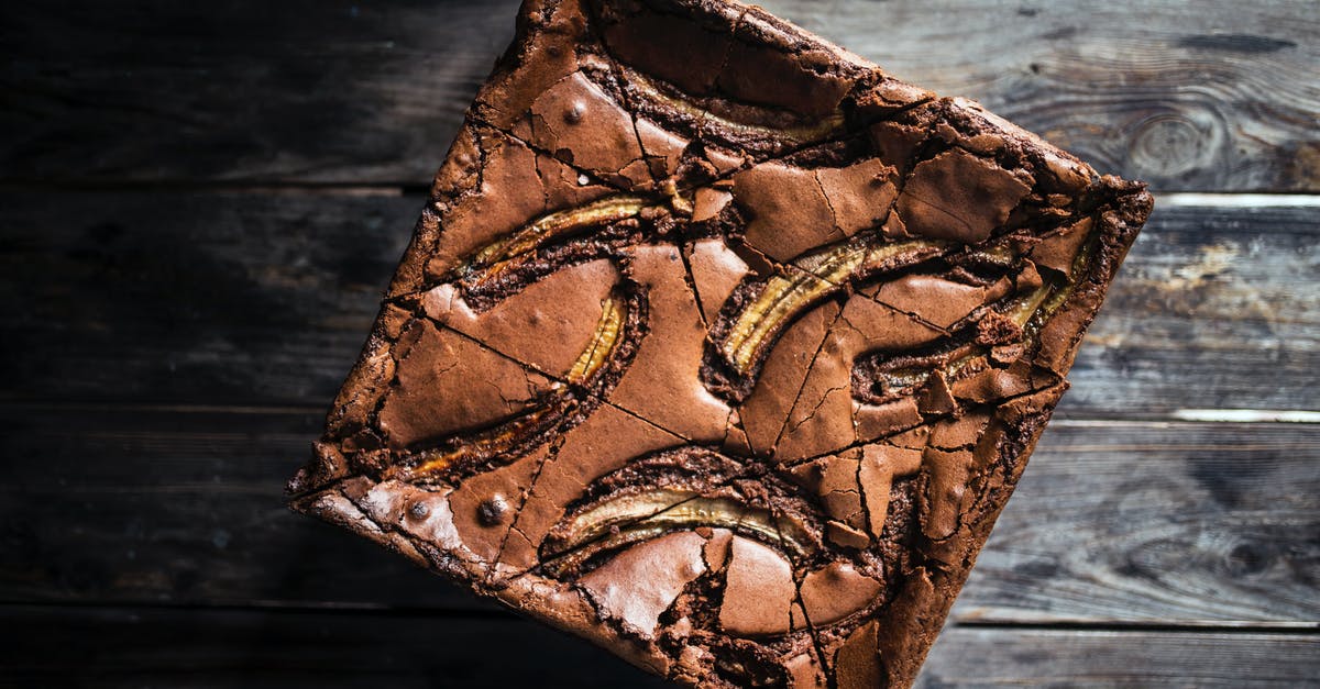 Can I replace a food processor in this brownie recipe? - From above of tasty chocolate brownie cake with dried bananas placed on wooden table in daytime