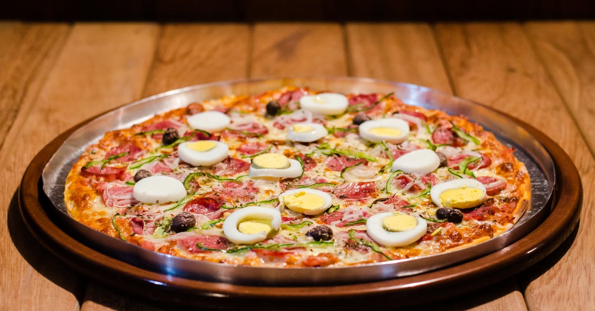Can I replace eggs, oil and water with apple sauce or just eggs? - Pizza Meal on Stainless Steel Tray