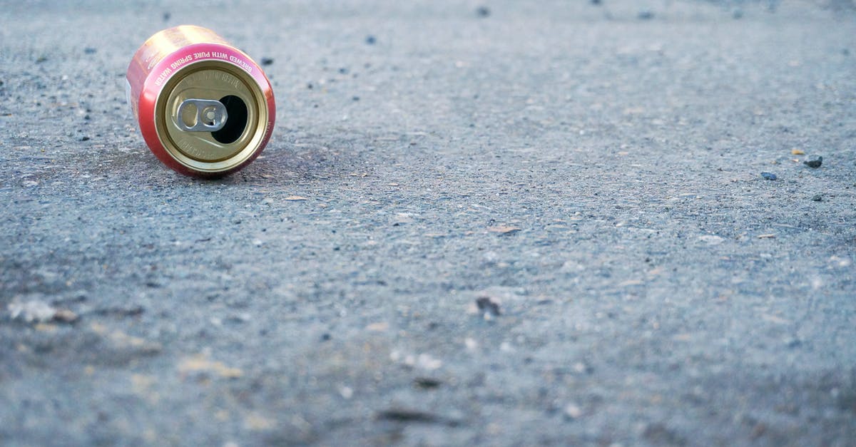 Can I reuse an alginate bath for reverse spherification? - Photo of Empty Soda Can on Concrete Floor