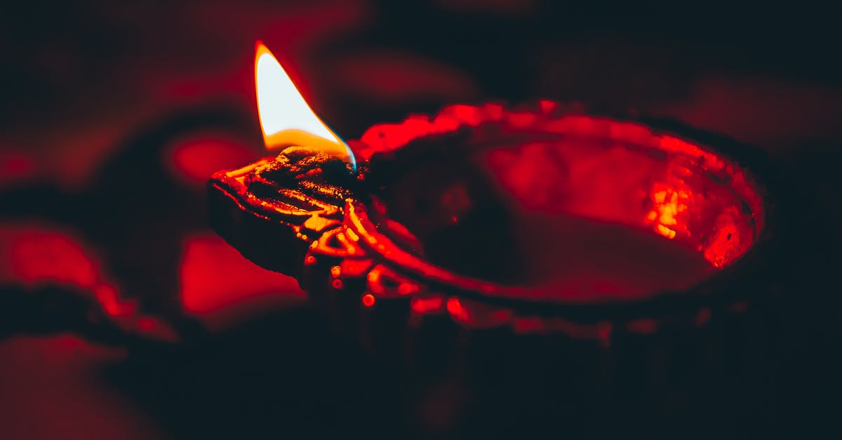 Can I Re-use Unfiltered Frying Oil From Night Before? - Diya burning on table in darkness Can I Re-use Unfiltered Frying Oil From Night Before? - Diya burning on table in darkness