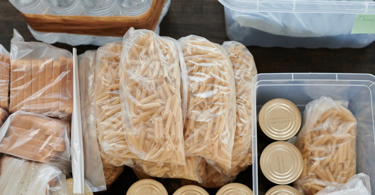 Can I salvage an uncooked bread? - Bags of Uncooked Macaroni Pasta Beside Canned Foods and Slices of Bread