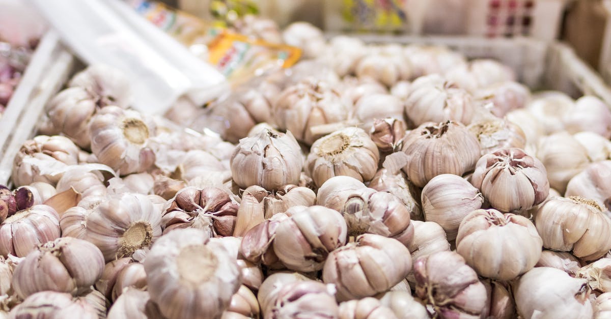 Can I separate garlic into cloves for storage? - Garlic in Bucket