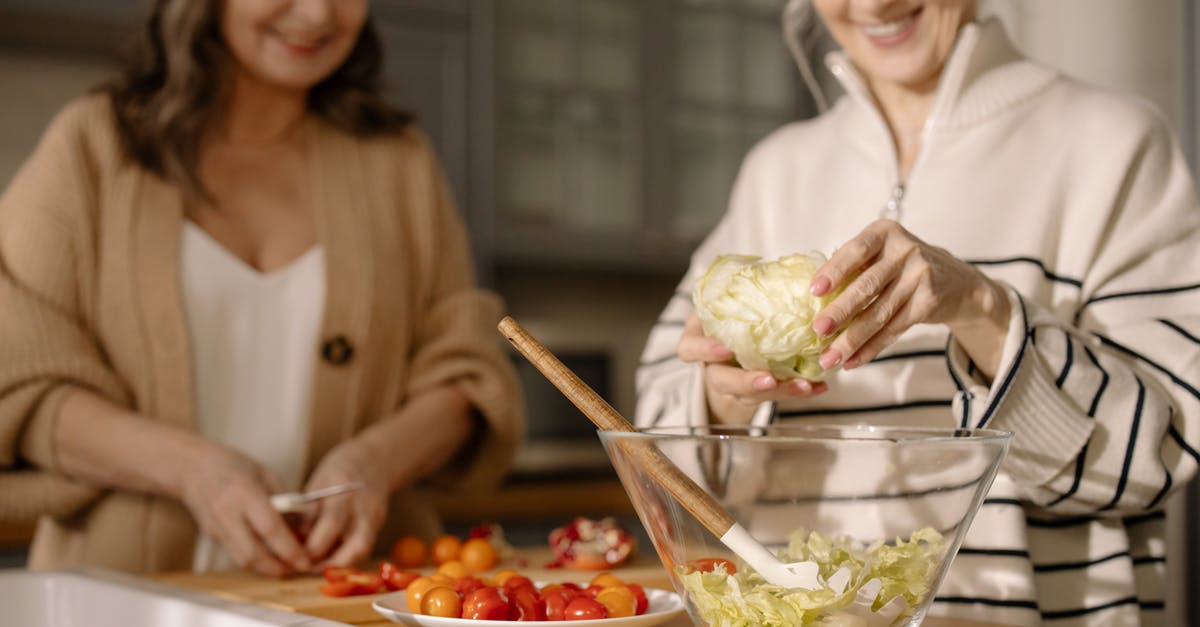Can I substitute cornstarch for commercially prepared clear glaze? - An Elderly Women Preparing Fresh Salad in the Kitchen