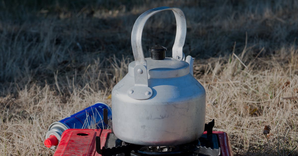 Can I take off the gas deflector on my stove for cooking with a wok? - A Kettle over a Portable Stove
