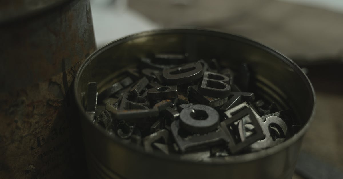 Can I use cast iron on a hot plate? - Black and Silver Can Showing Back Content