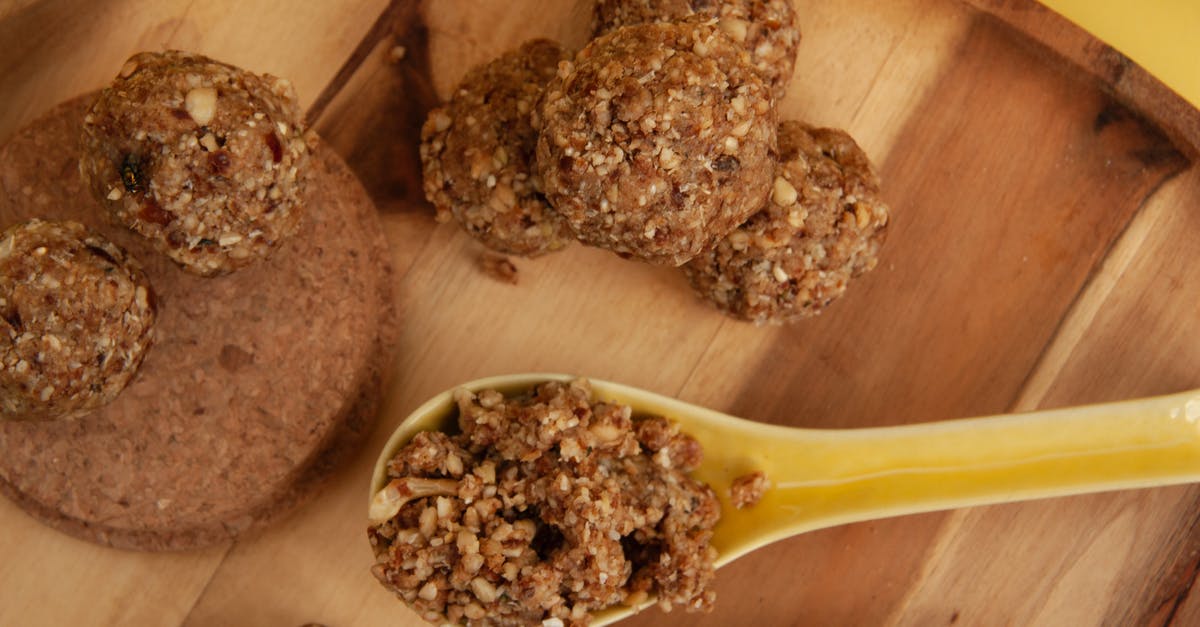 Can I use ground beef meatballs in stews like Boeuf Bourgogne? - Overhead Shot of Ground Meat on a Spoon