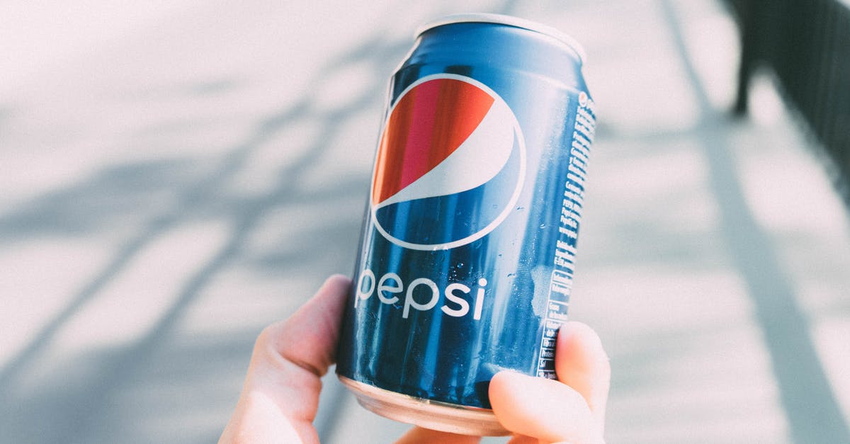 Can I use washing soda to cook noodles? - Person Holding Pepsi Can