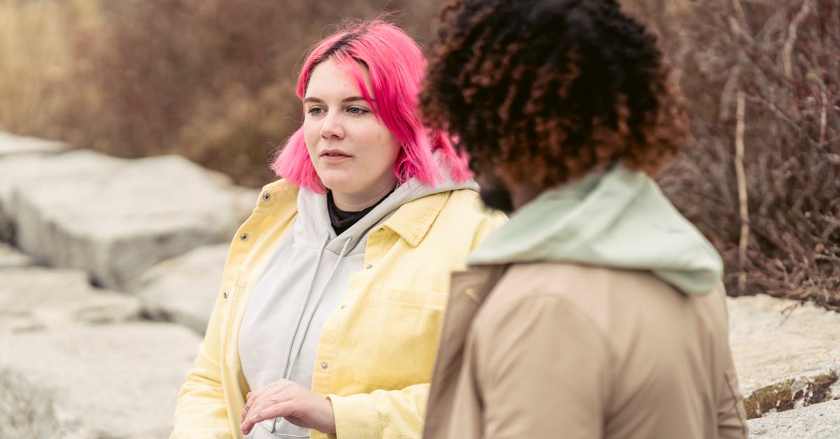 Can I utilise a baking stone to make crepes? - Calm plump female with pink hair and can of soda in hand sitting near faceless African American man during date