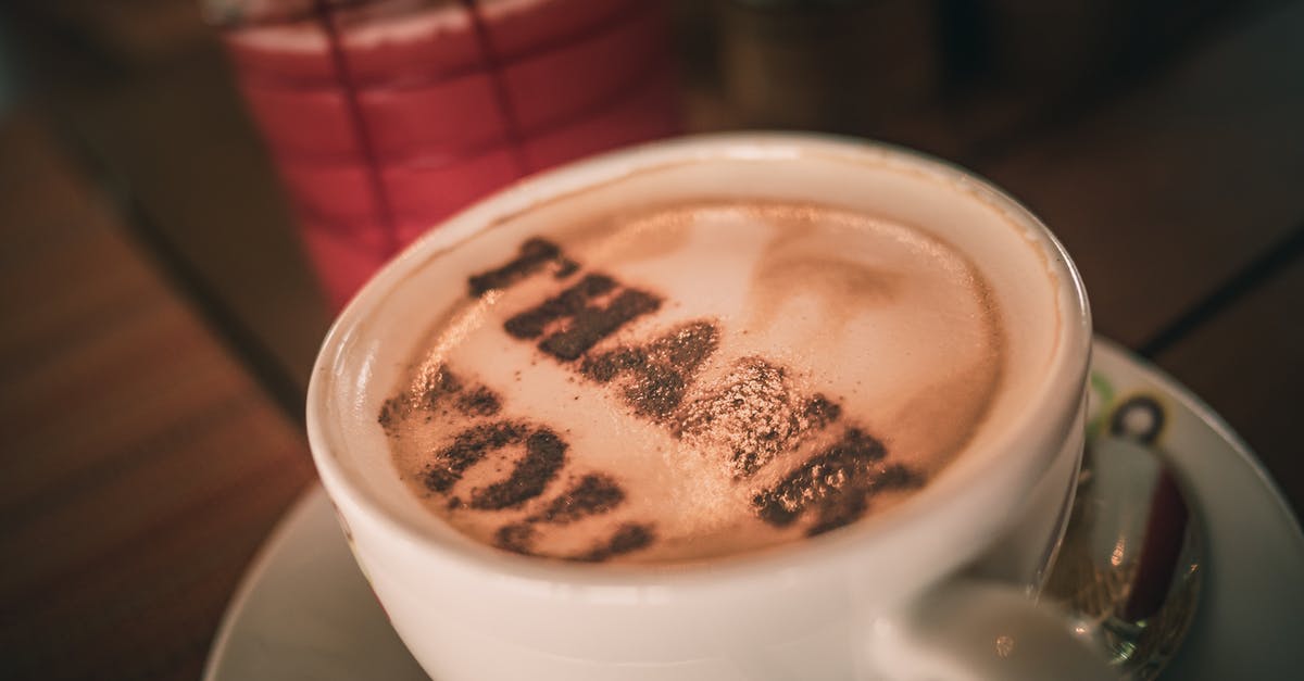 Can milk chocolate plus cocoa powder substitute for dark chocolate? - Cup of aromatic cappuccino with Thank You words on foam