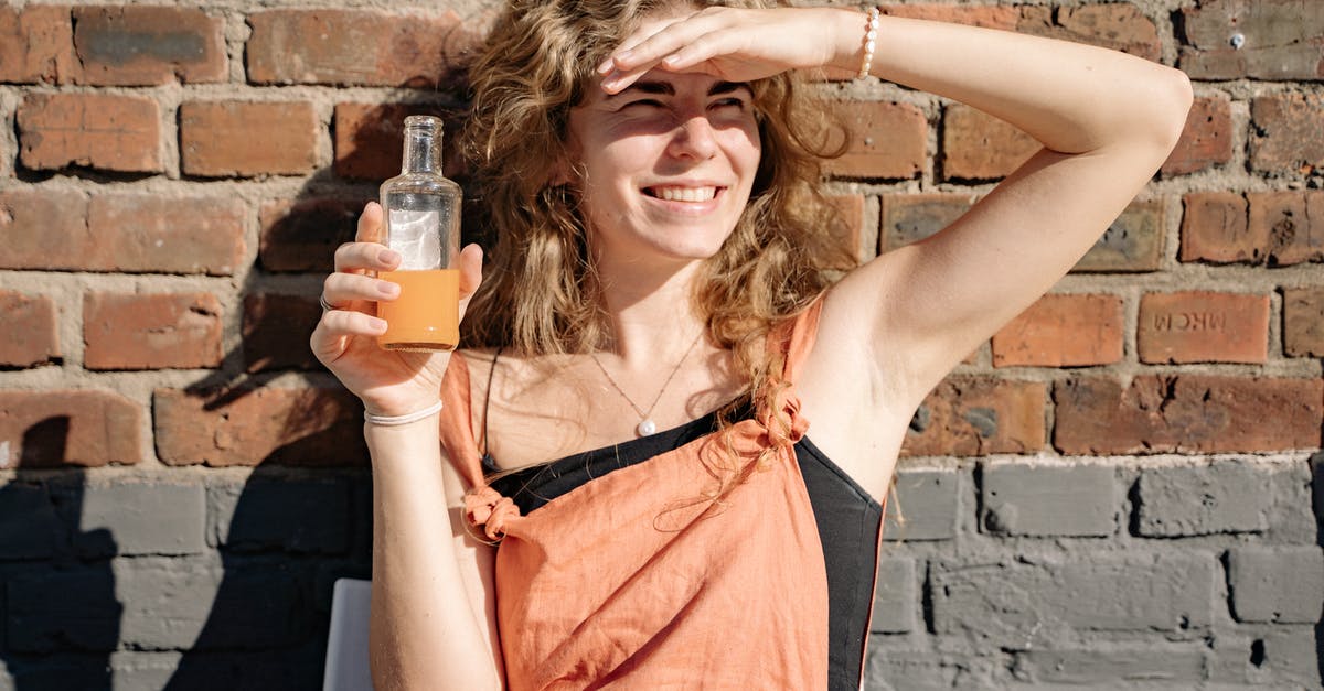 Can "juice from concentrate" be diluted 100% juice? [duplicate] - Woman Having a Drink on a Hot Day 