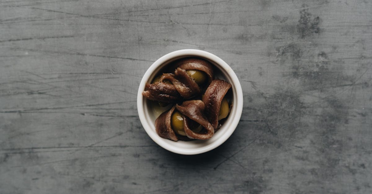 Can someone identify this herb? - Brown Coffee Beans in White Ceramic Mug