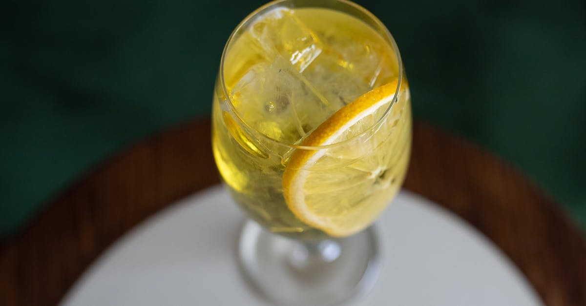 Can wine be made from citrus fruits? - A Wine Glass with Sliced Lemon and Ice