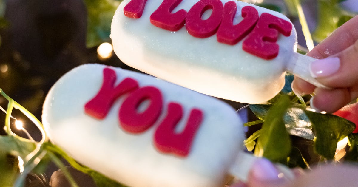 Can you brine frozen meat? - Person Holding Ice Pops With Text