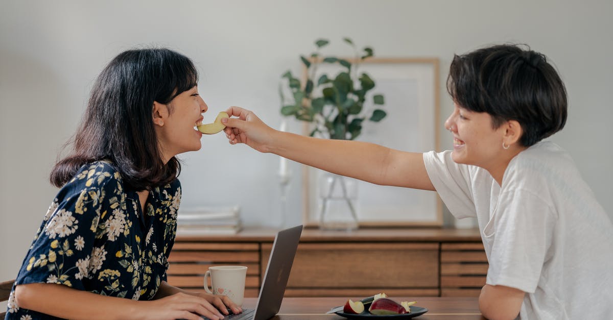 Can you eat beans after using them as pie weights? - Photo of Couple Smiling While Sitting by the Wooden Table