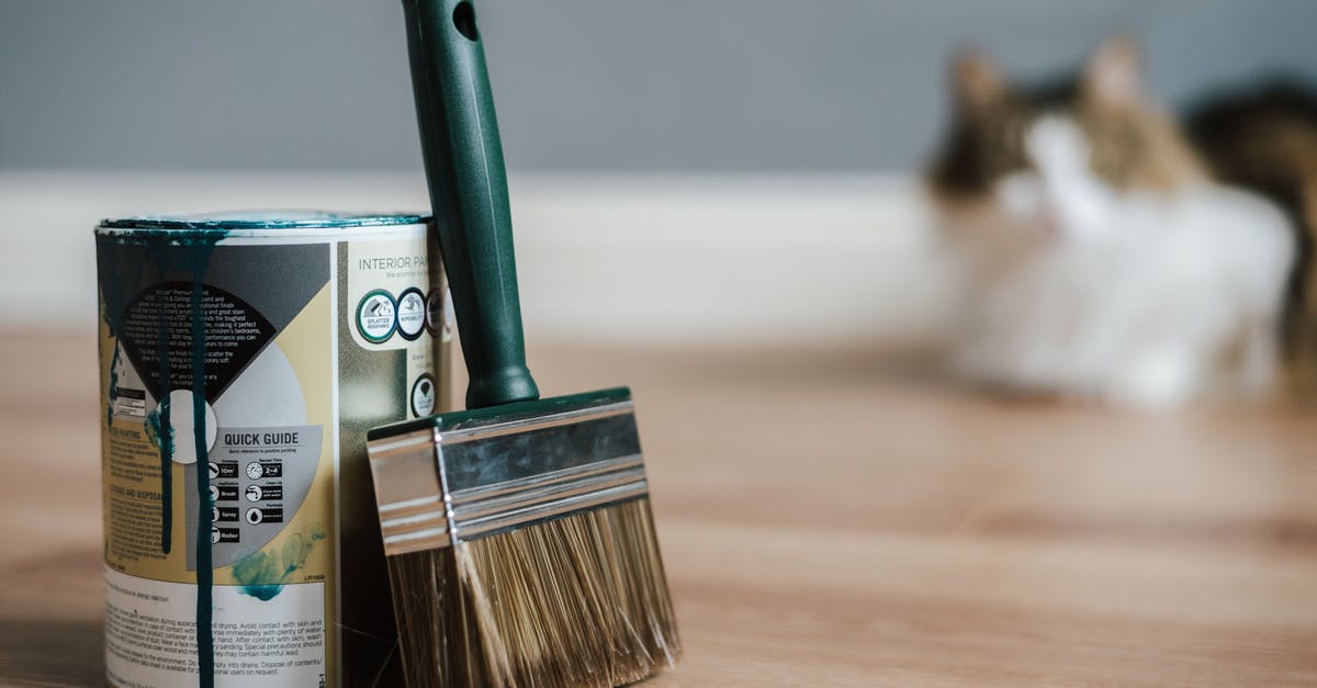 Can you freeze a plastic mixer bowl? - Paint brush near can on floor at home