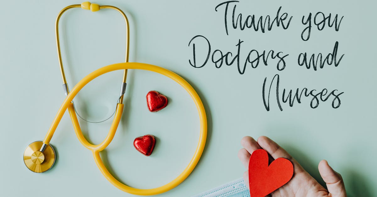 Can you help me identify this appliance/tool? - Yellow stethoscope composed with red hearts on white background with thank you doctors and nurses text and medical mask