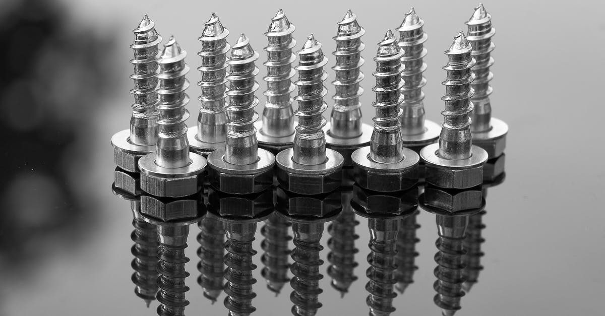 Can you make nut butters without dehydrating nuts? - Selective Focus Photography of Silver Screws