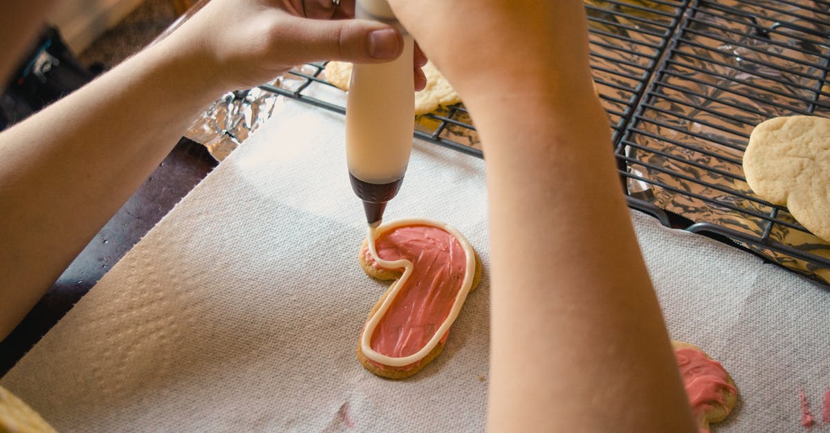 Can you re-use parchment paper when baking batches of cookies? - Beige Cookie With Filling