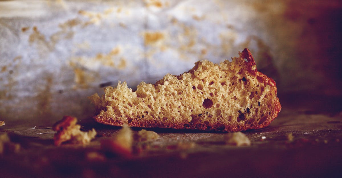 Can you re-use parchment paper when baking batches of cookies? - Brown Bread on Brown Wooden Table