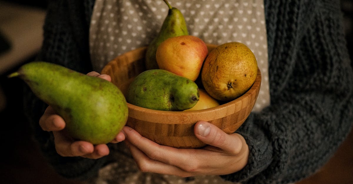 Can/do apples and pears ripen? - Close-Up View of Pears and Apples in Bowl