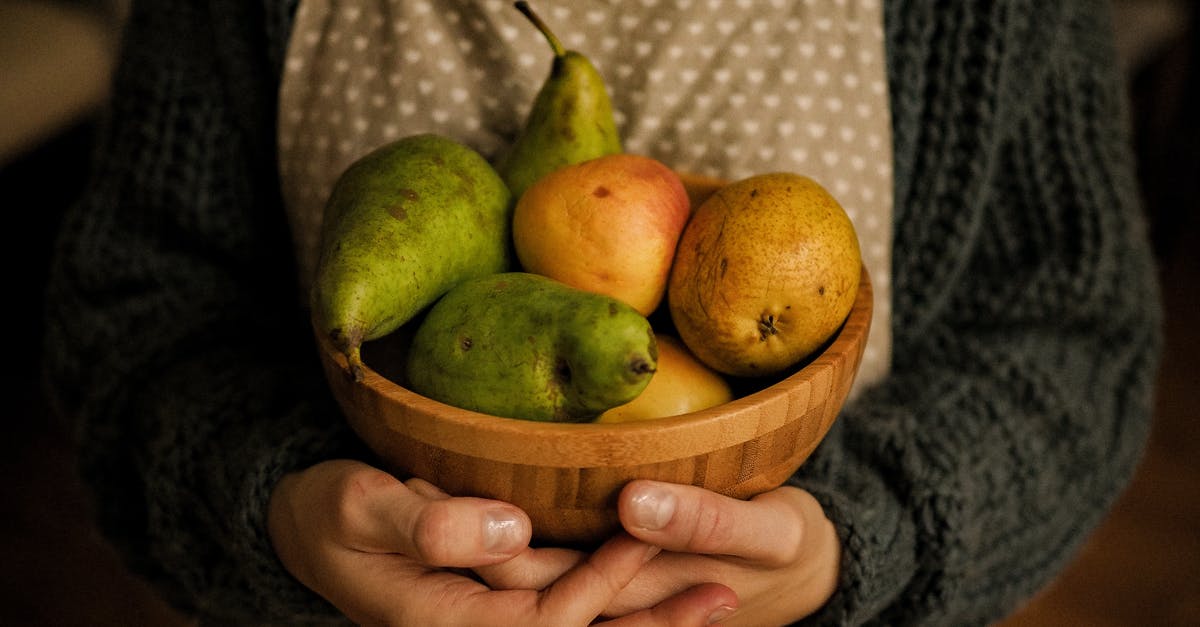 Can/do apples and pears ripen? - Hands Holding Bowl with Fruits