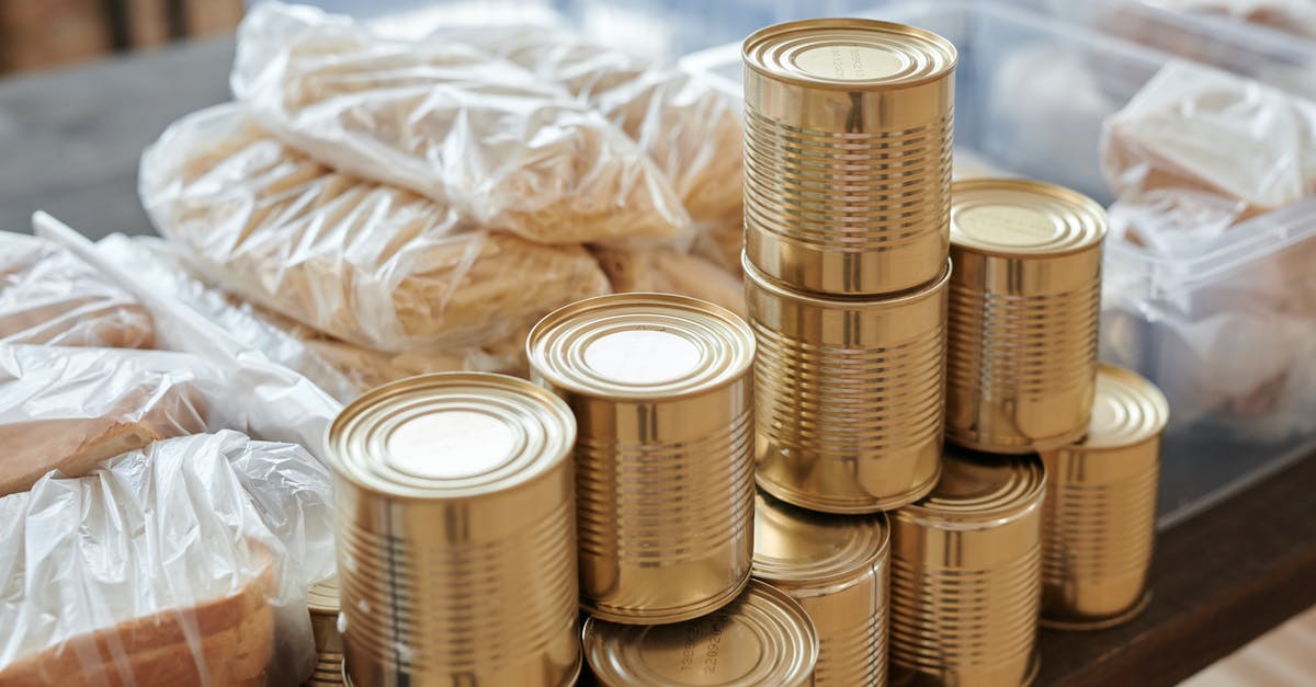 Canned food, botulism and ph [duplicate] - A Close-Up Shot of Canned Goods