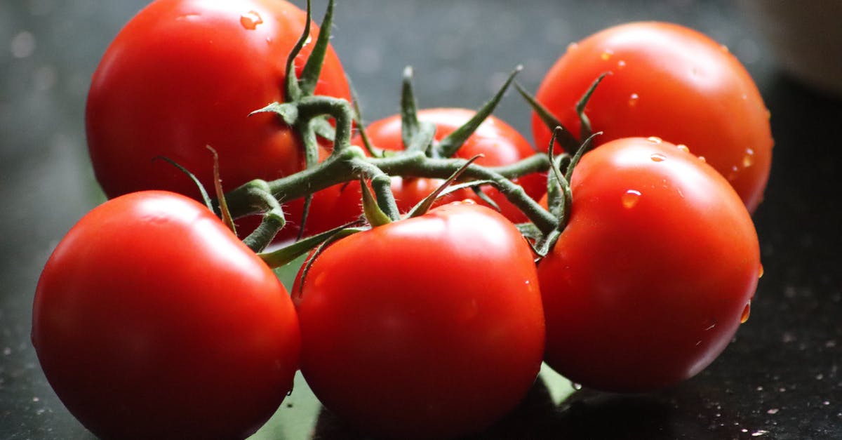 Canned tomatoes for fresh - Red Tomato on Black Surface