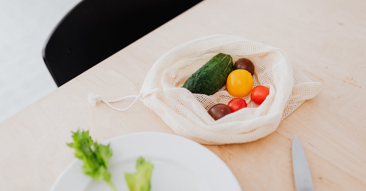 Canned tomatoes with too much vinegar - Multicoloured Vegetables in a Textile Bag on Table