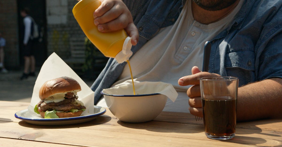 canning a mustard vinegar sauce - Person Putting Mustard Sauce in Ceramic Bowl 