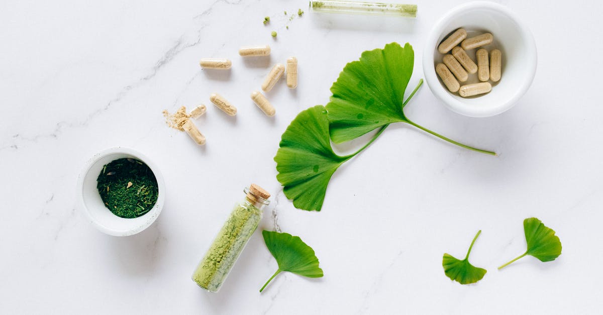 Canning pickles and sealing lids - Ginkgo Leaves and Glass Containers with Powder