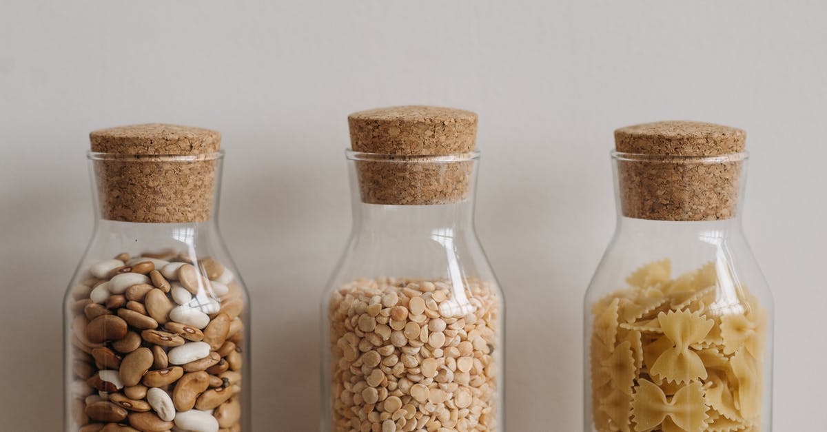 Canning pickles and sealing lids - Pasta and Beans in a Glass Container With Cork Lids