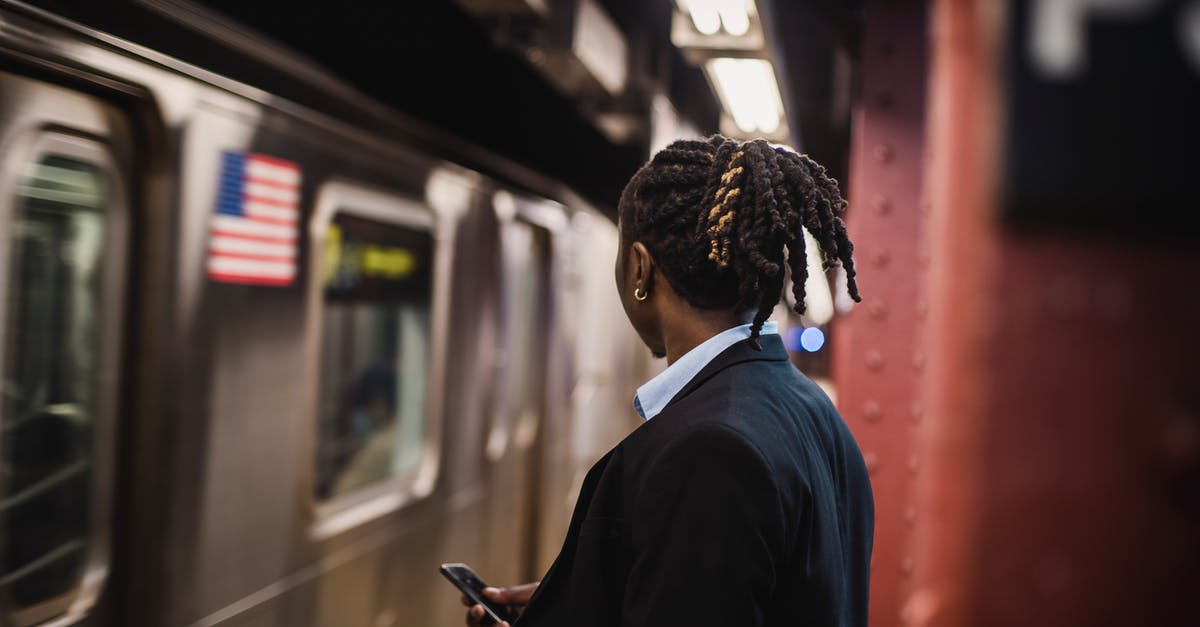 Can/should I use rapid rise yeast for longer proofing? - Man in suit looking at arriving train on subway