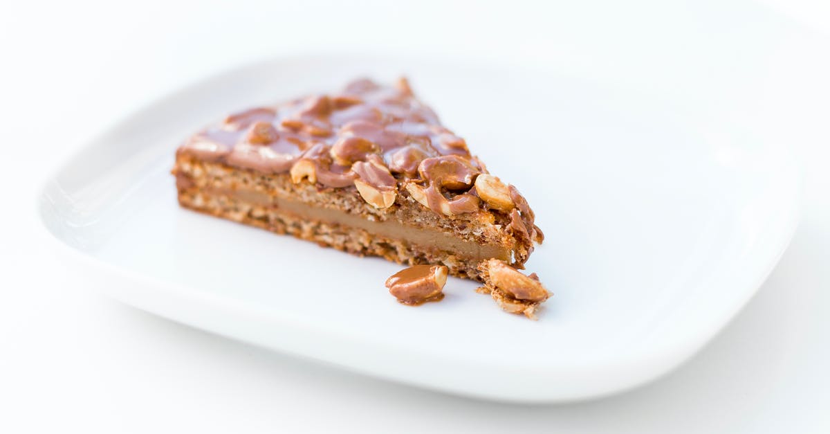 Caramel Coating producing inconsistent results - A Slice of Caramel Cake With Chocolate Coated Nuts