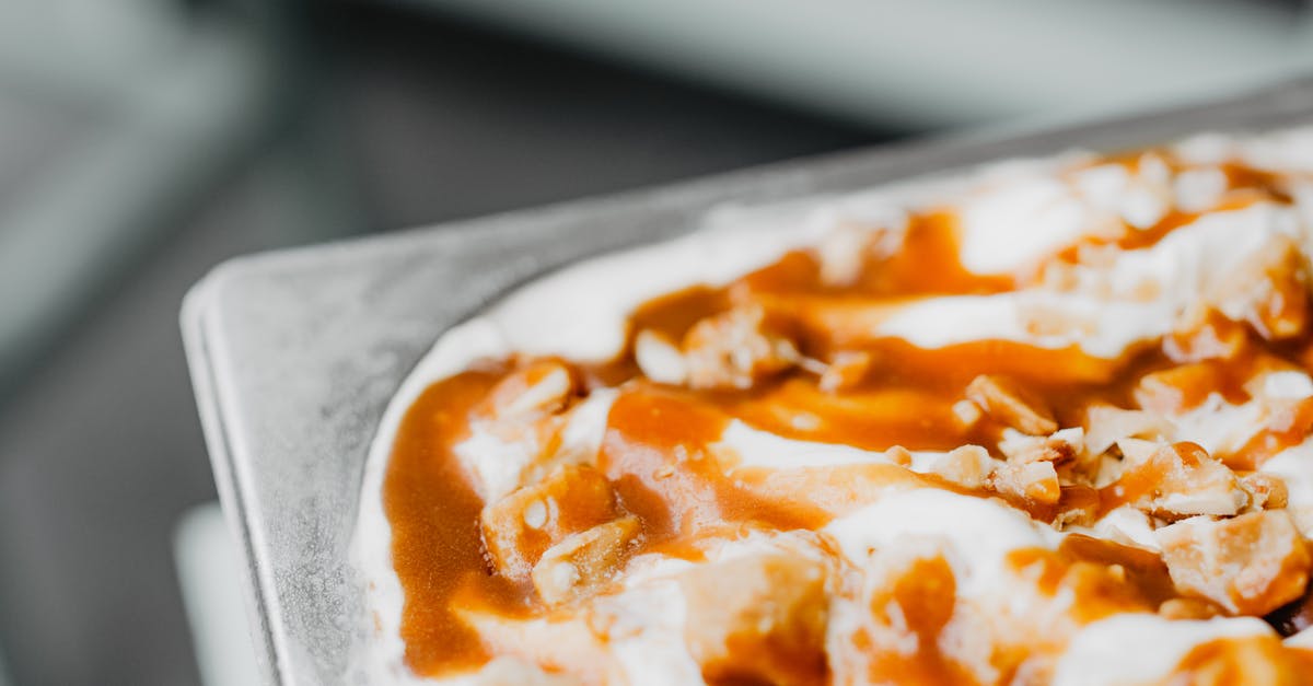 Caramels turn out too sweet - Close-up of a Tray with Ice Cream with Caramel Sauce