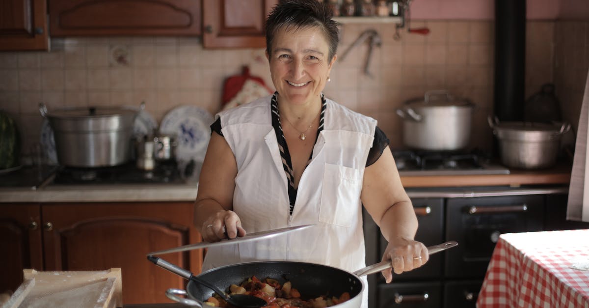 Cassolette Pans - Cooking on the Stovetop and in the Oven - Elderly Woman in White Button Up Shirt Cooked a Delicious Meal