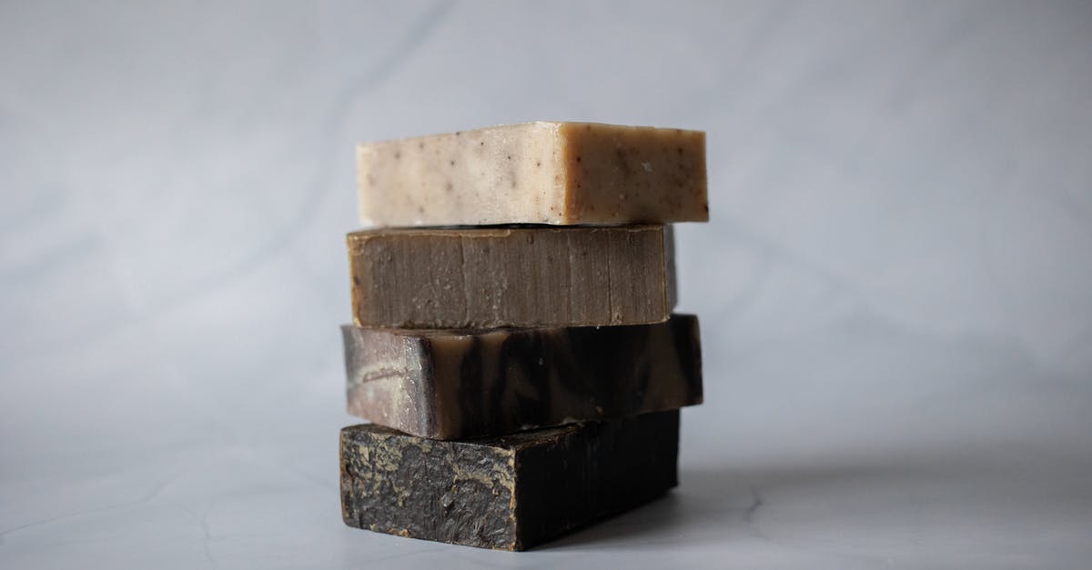 Cast iron moisture on inside top - Stack of eco friendly soaps placed on marble surface