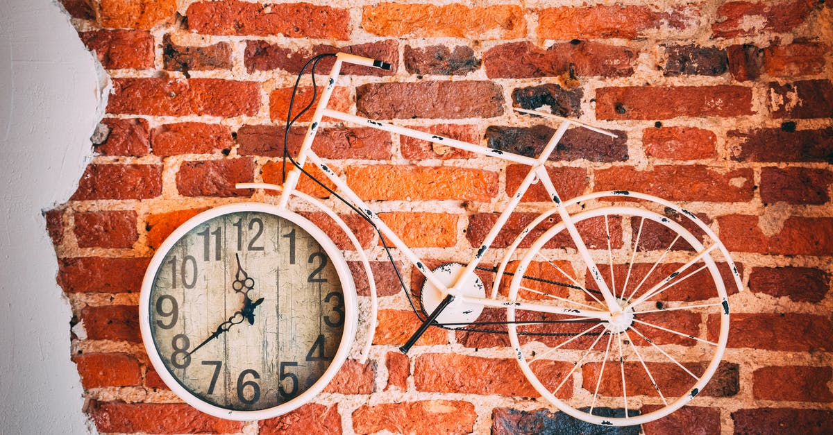 cast iron pan rusting on bottom surface - Round Brown Wall Clock