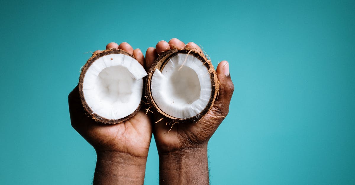 Celeriac (aka: Celery Root) Skin - Edible or Not? - Photo Of Person Holding Coconut