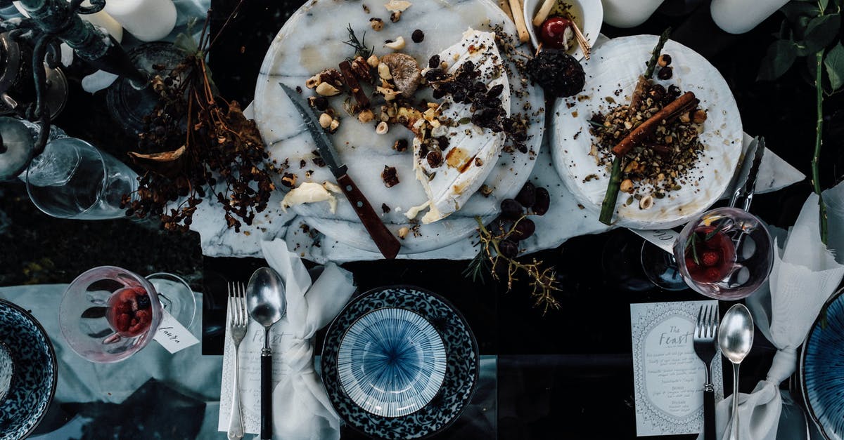 Ceramic made from alumina poisonous? - Banquet table with served food and cutlery