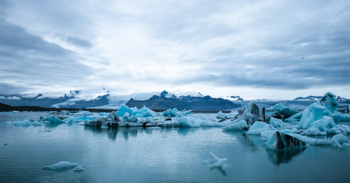 Changing Sous Vide water - Scenic View Of Snow Capped Mountains Under Cloudy Sky