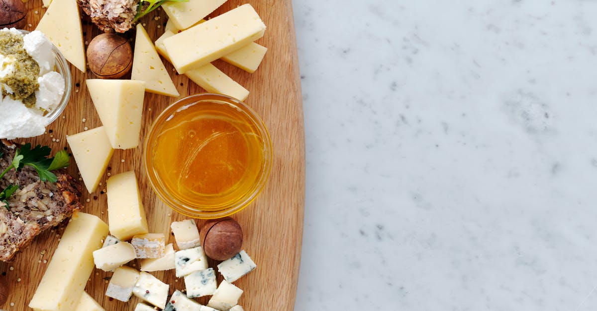 Cheese from UHT Milk - Sliced Fruits on Brown Wooden Chopping Board