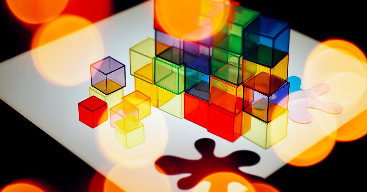 Cheesemaking produces strange bicolored whey - Colorful Cubes And Puzzle Piece