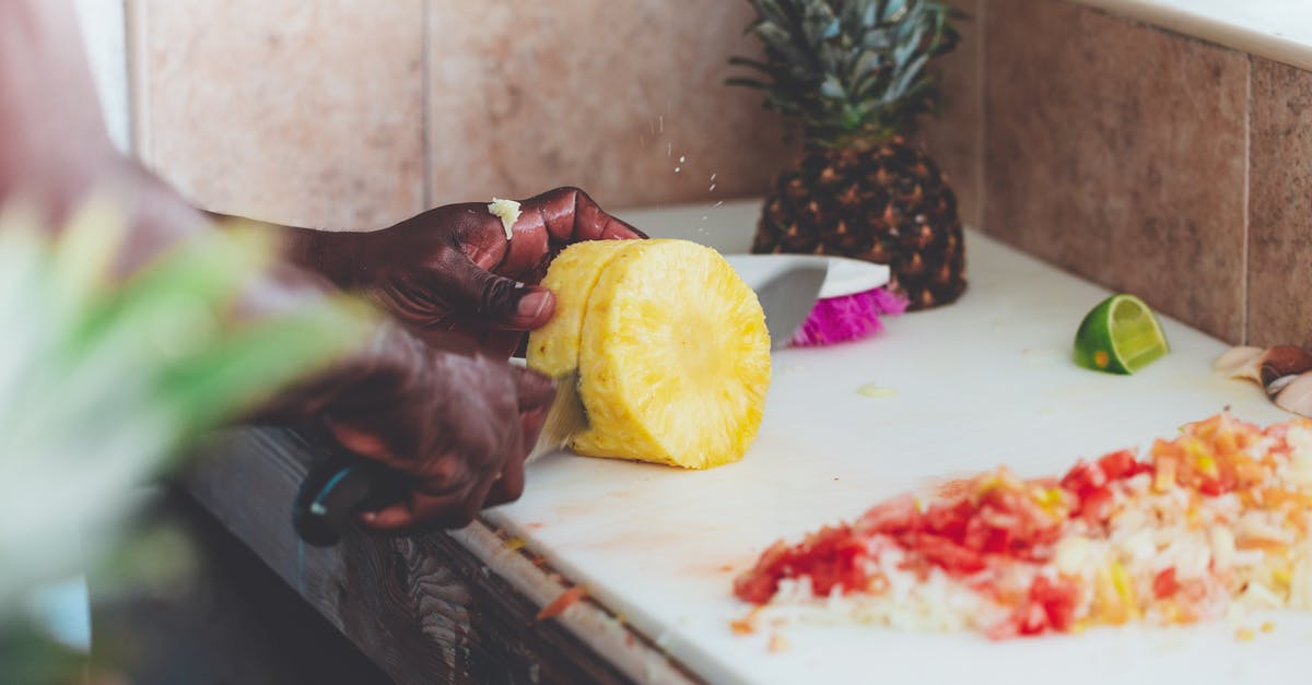 chef's knife for cutting chicken, or butcher's - Person Chopping Fruit