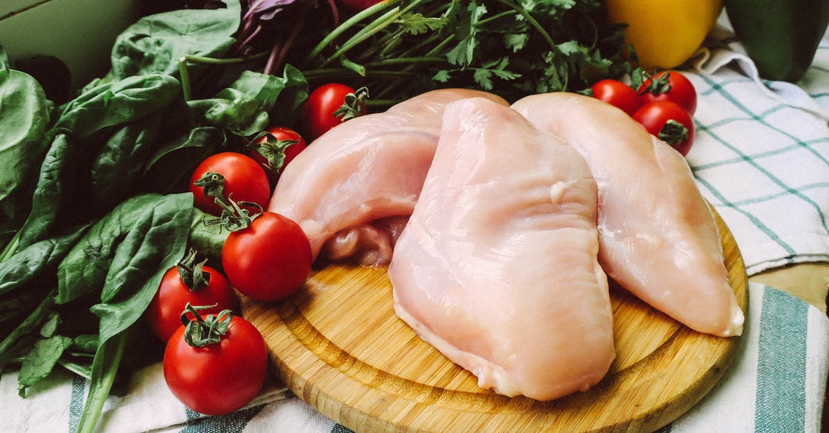 Chicken comes out salty... occasionally - Red Tomato and Green Leaves on Brown Wooden Chopping Board